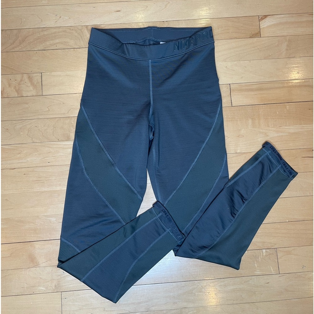 NIKE PRO ~ Women’s Grey (with purple mesh lining) Athletic Leggings. Size small.